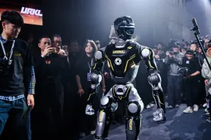 URKL T800 robot walking the runway in front of a crowd filming with their phones